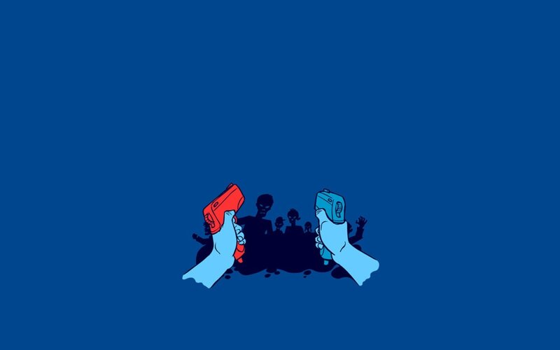 hands holding guns against zombies