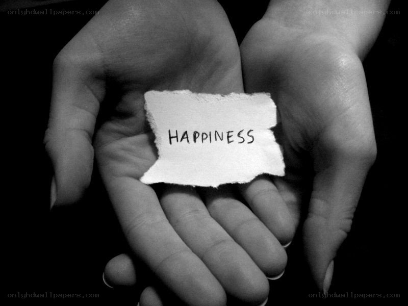 hands holding happiness note