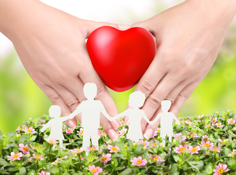 Hands Holding Heart and Family