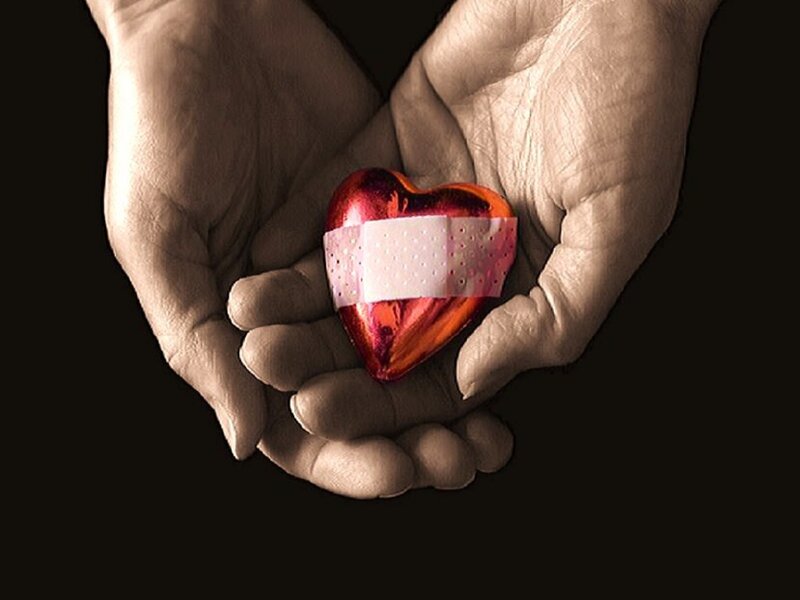 Hands Holding Heart — Black, Dramatic