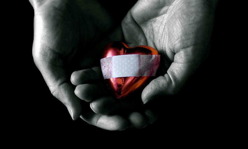 Hands Holding Heart — Black