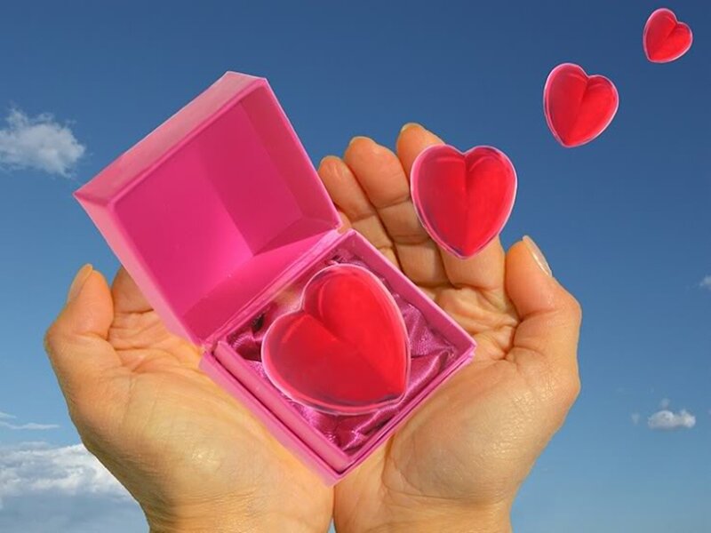 Hands Holding Heart Box