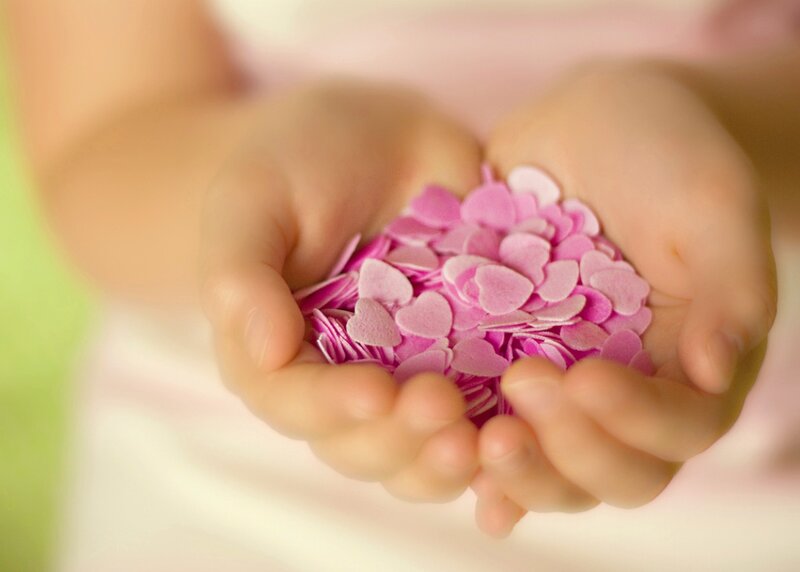 Hands Holding Heart Confetti