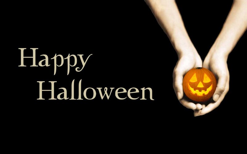 Hands Holding Jack-o-lantern