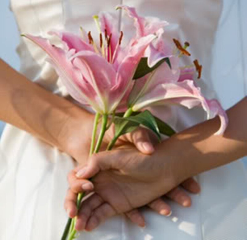 Hands Holding Lilies