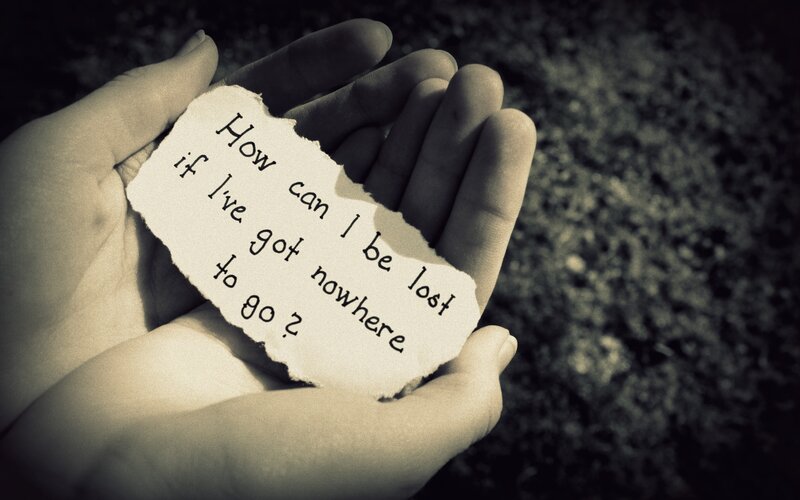 Hands Holding Note