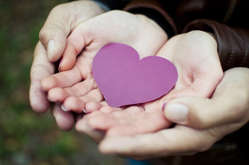 Hands Holding Paper Heart — Purple