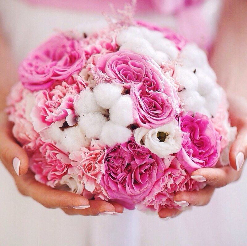 Hands Holding Pink Bouquet