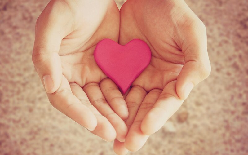 Hands Holding Pink Heart — Calm