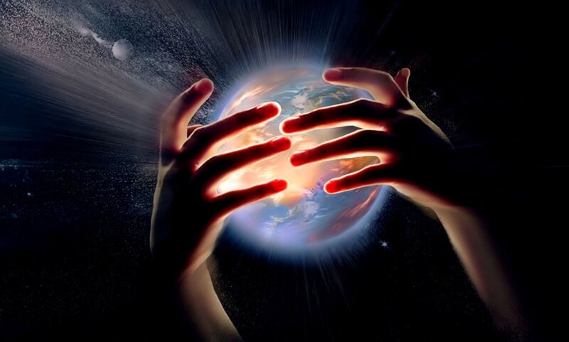 Hands Holding Planet Earth — Black
