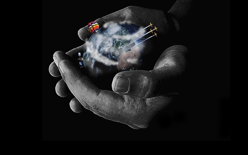 Hands Holding Planet Earth