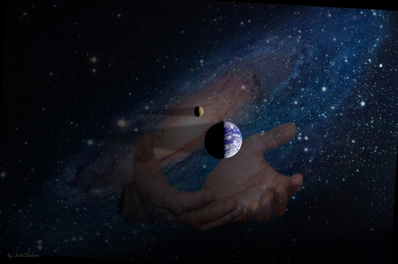 Hands Holding Planets