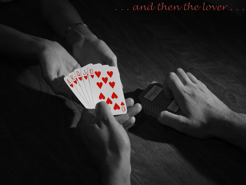 Hands Holding Playing Cards