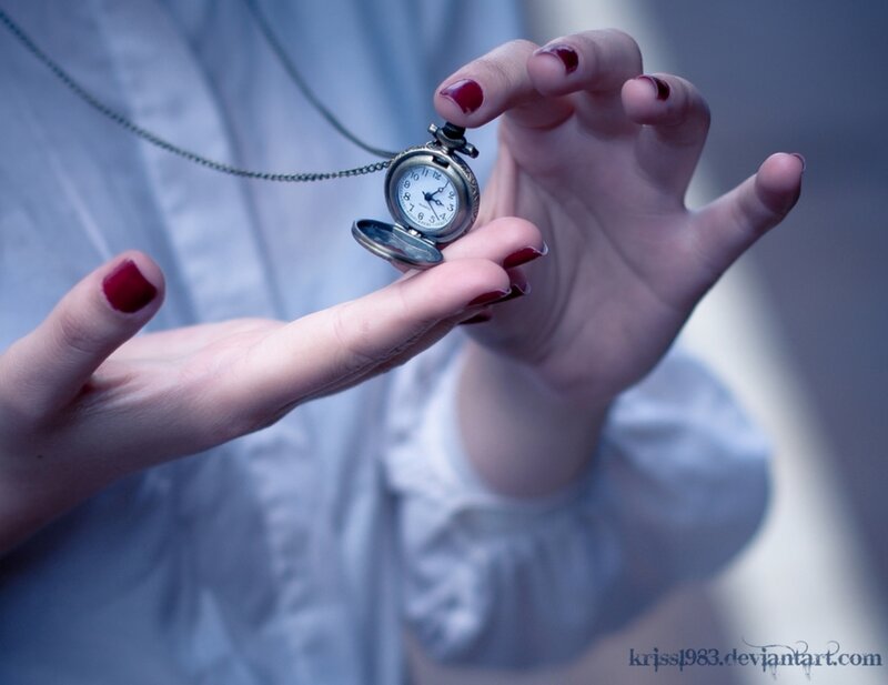 Hands Holding Pocket Watch — Blue
