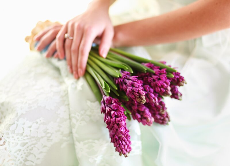 Hands Holding Purple Flowers — Serene, Photograph, Ring