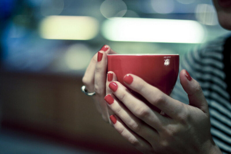 Hands Holding Red Cup