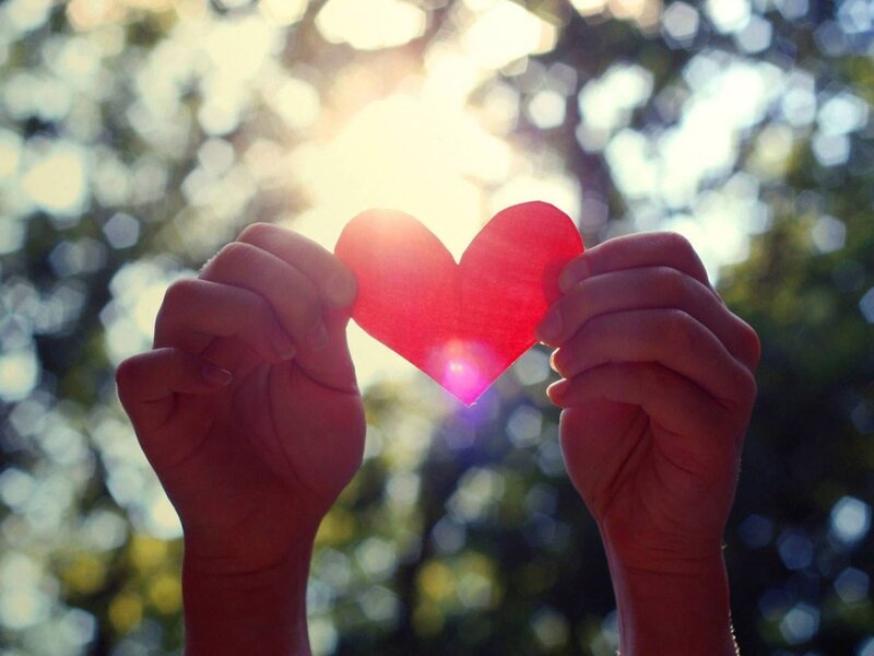 hands holding red heart