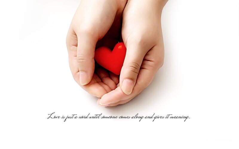 hands holding red heart