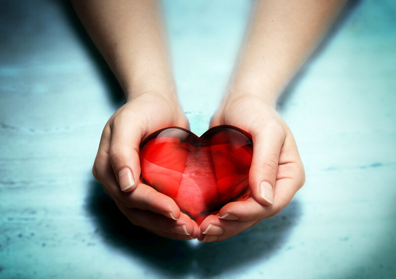 Hands Holding Red Heart — Calm, Photograph, Blue Surface