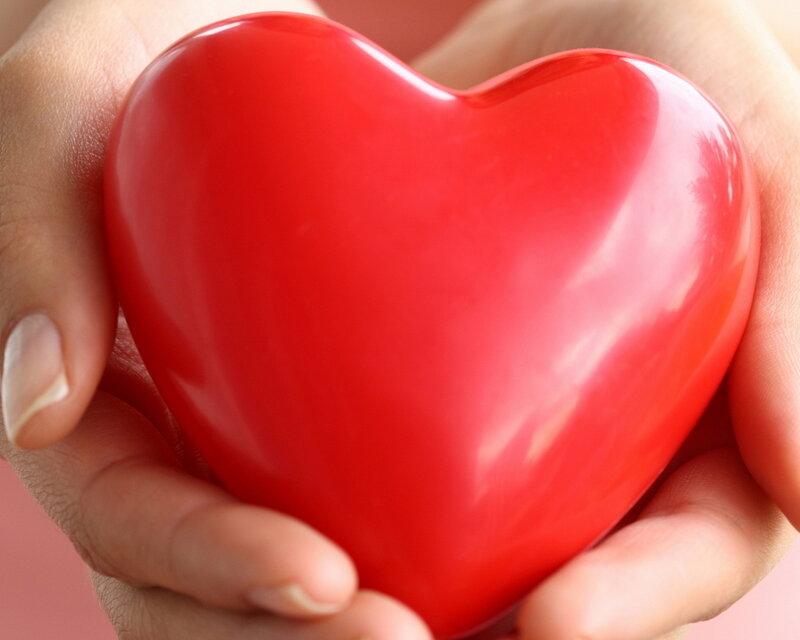 Hands Holding Red Heart — Calm