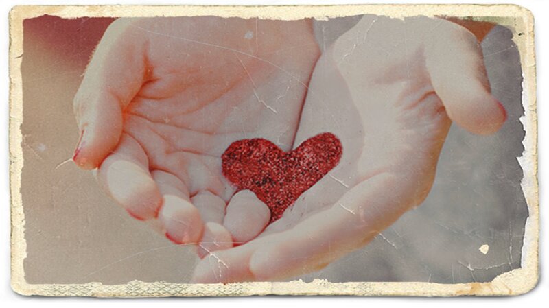 Hands Holding Red Heart — Sentimental