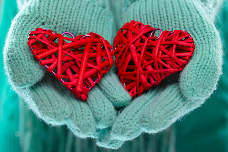 Hands Holding Red Hearts — Green