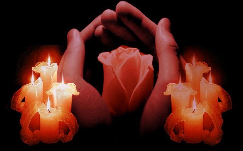 Hands Holding Rose and Candles