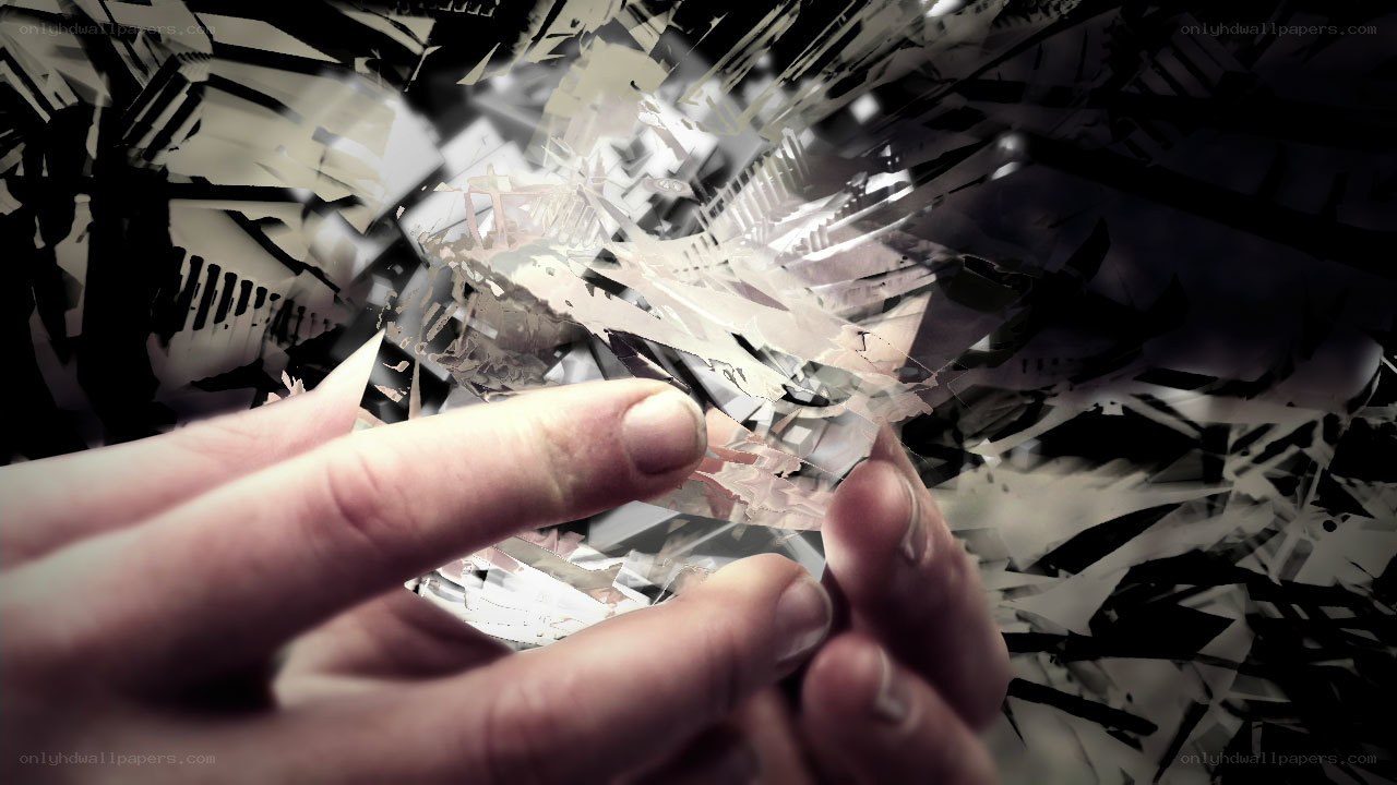 hands holding shattered glass