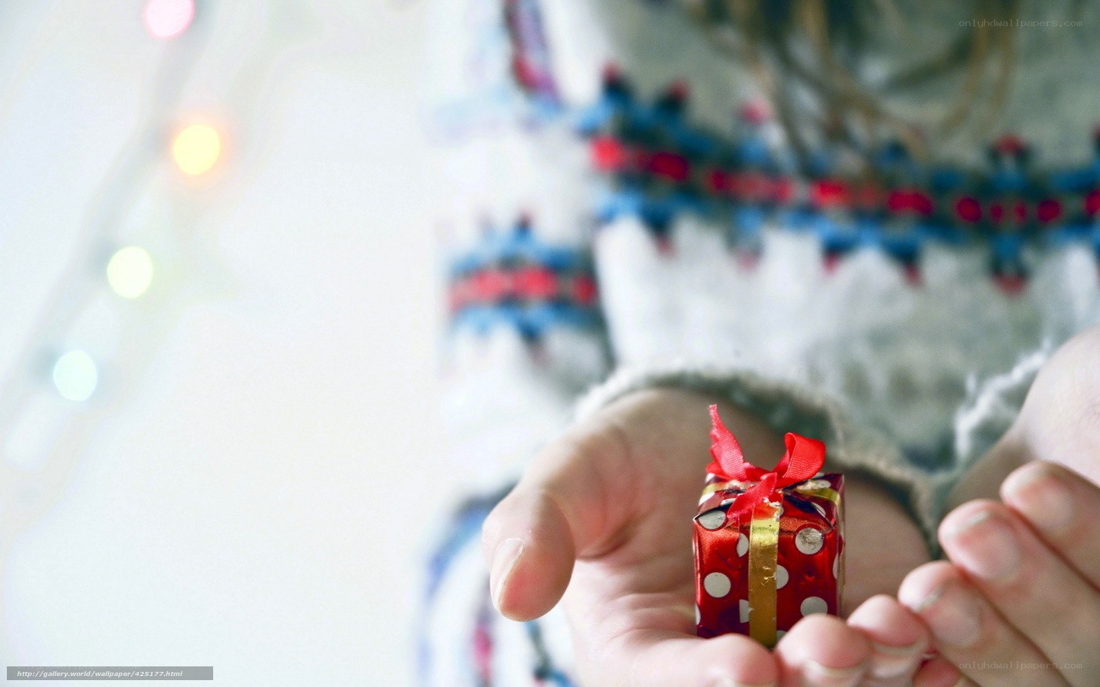 hands holding small gift