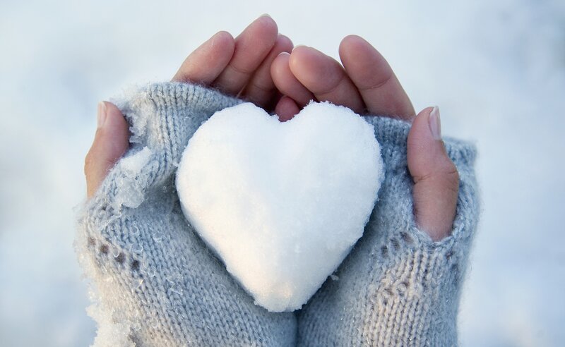 Hands Holding Snow Heart — White