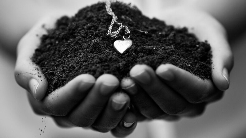 Hands Holding Soil — Black, Somber, Photograph, Necklace