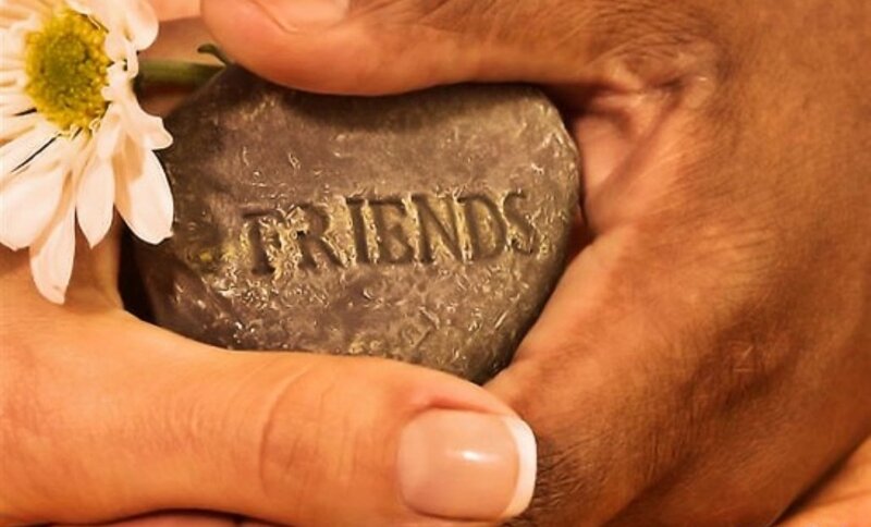 Hands Holding Stone