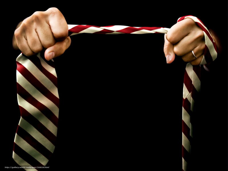 Hands holding striped tie