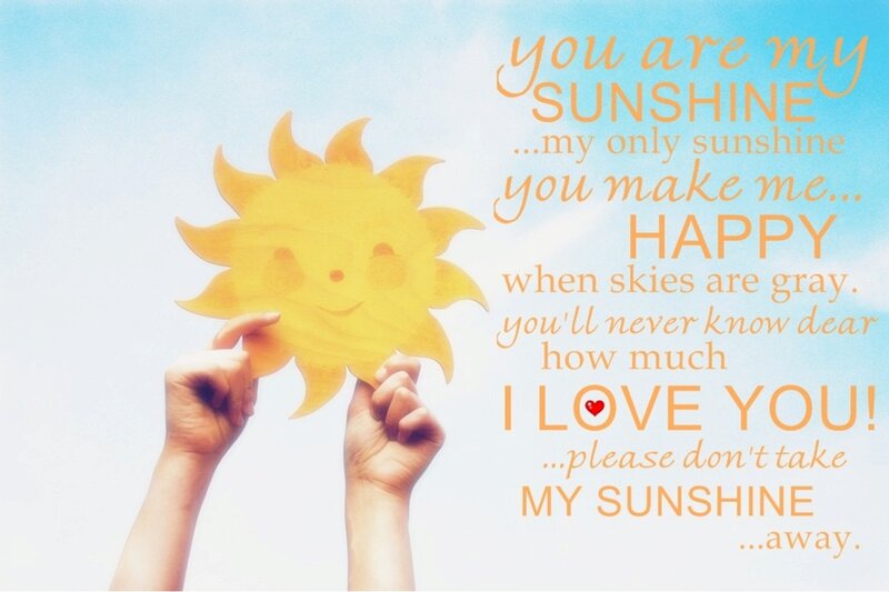Hands Holding Sun Cutout — Yellow
