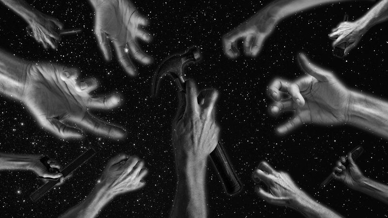Hands Holding Tools