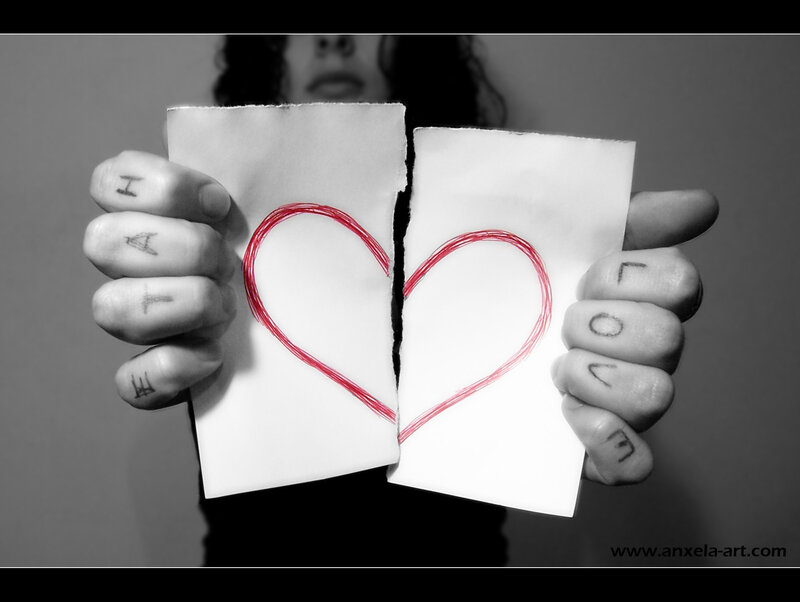 Hands Holding Torn Paper