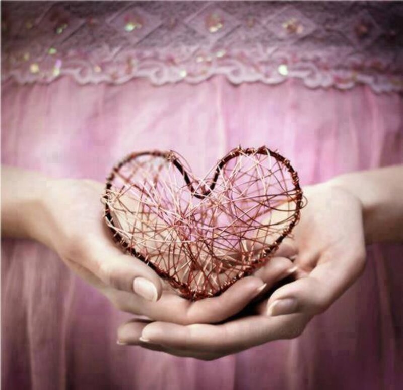 Hands Holding Wire Heart — Pink