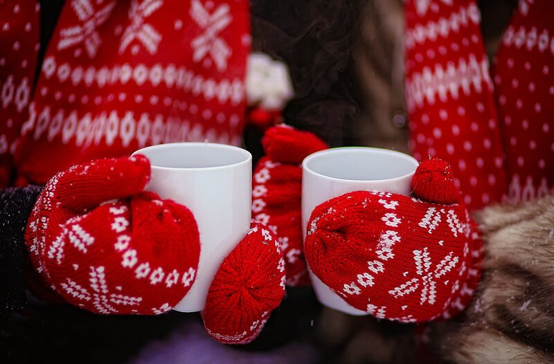 Hands in Mittens Holding Mugs