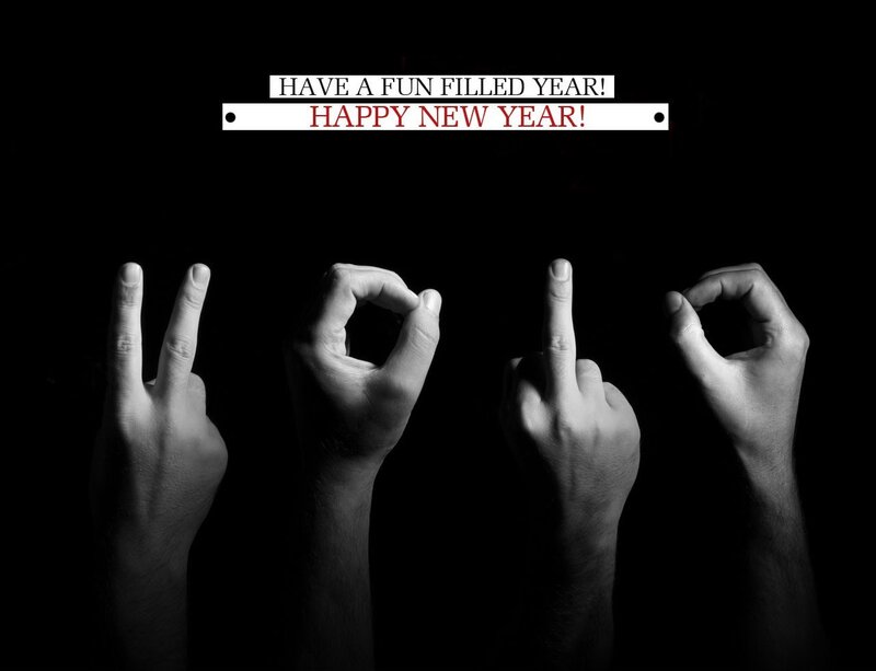 Hands making gestures with New Year's message