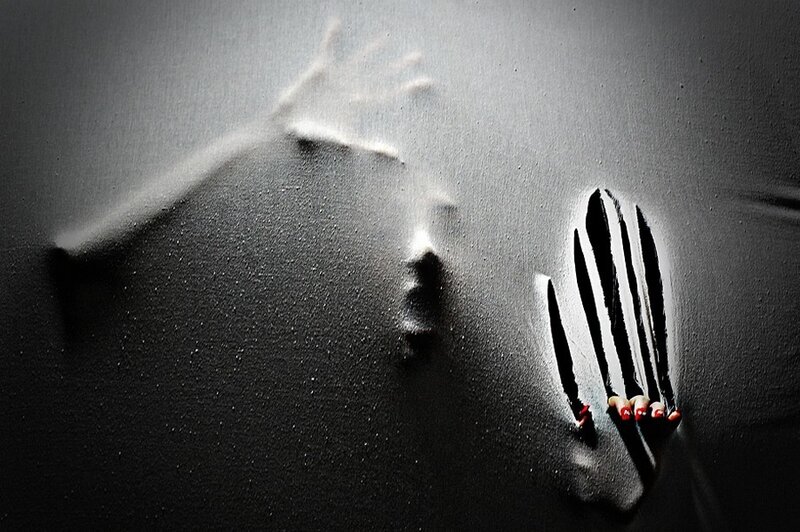 Hands on Dark Surface