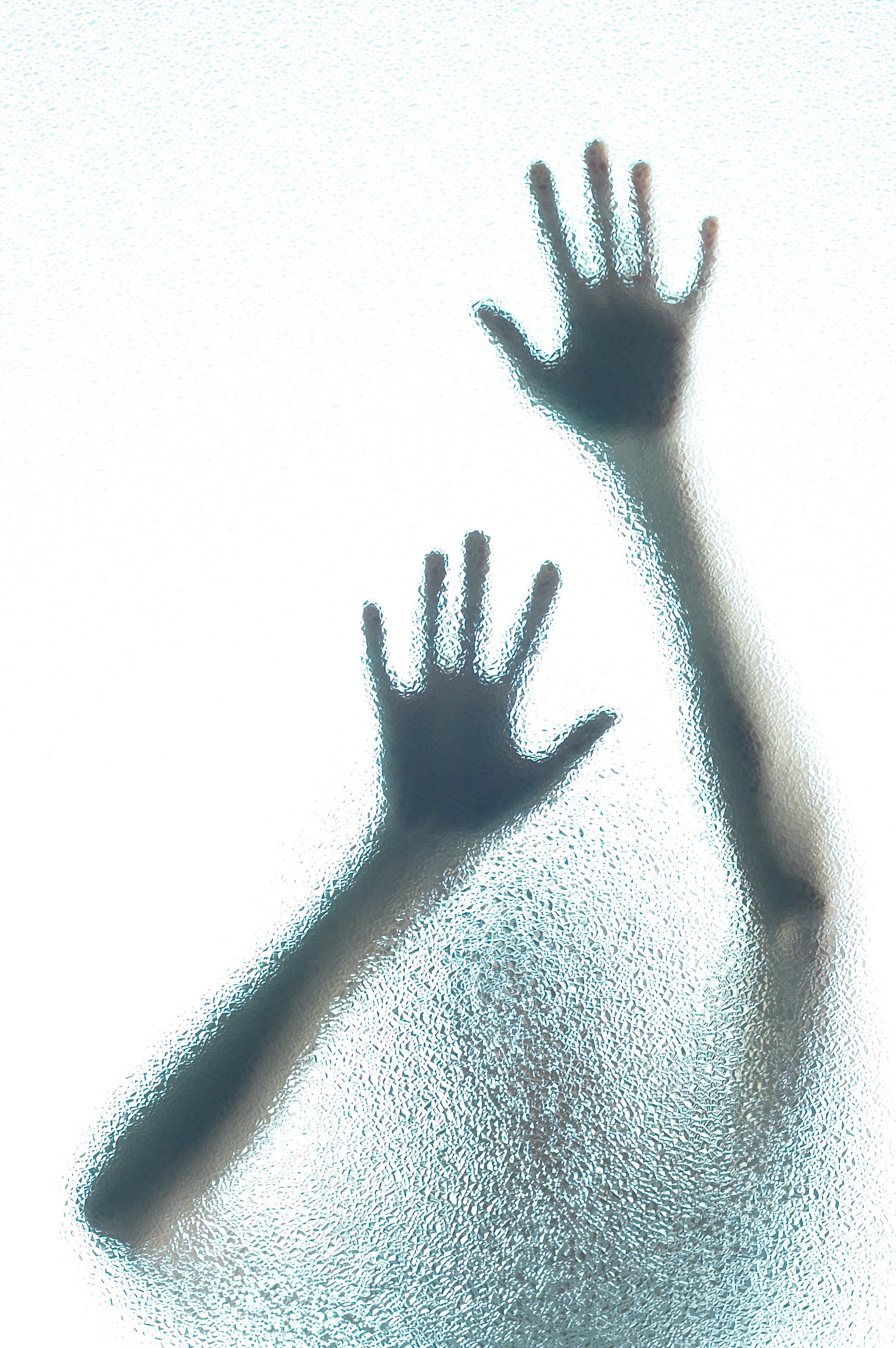 hands on frosted glass