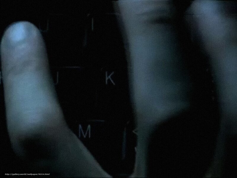 hands on keyboard in dark