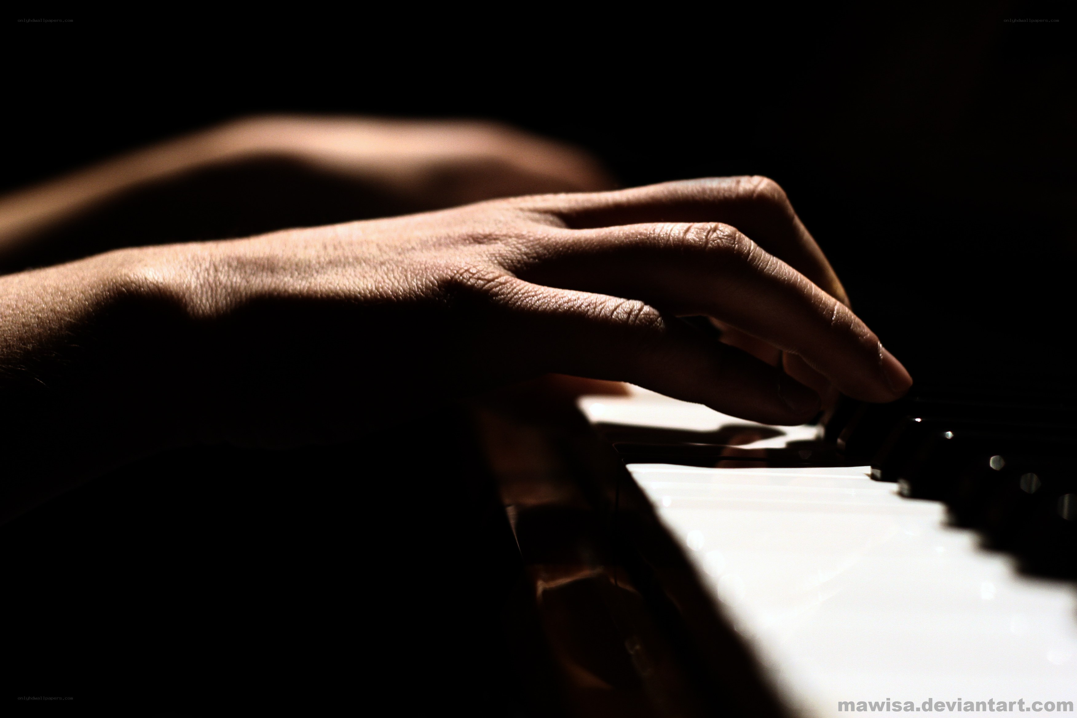hands on piano keys