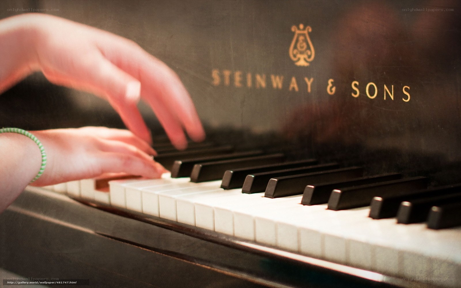 hands on piano keys