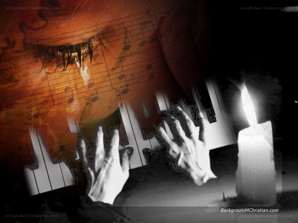 Hands on piano with sheet music