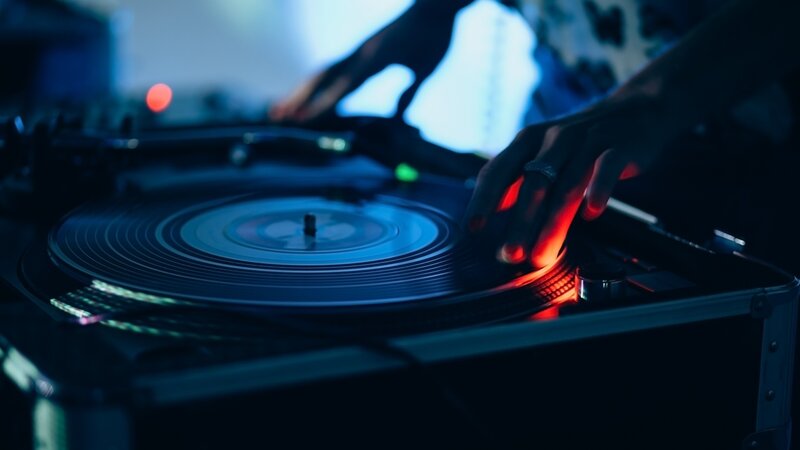 Hands on Turntable — Blue, Dark
