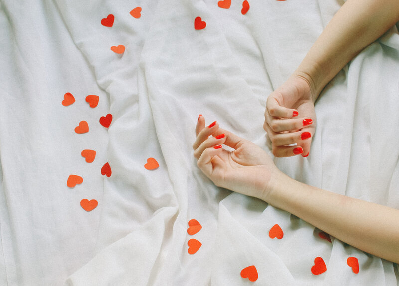 Hands on White Sheet