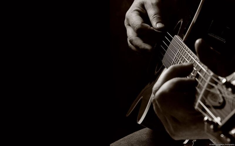Hands Playing Guitar — Black, Dramatic