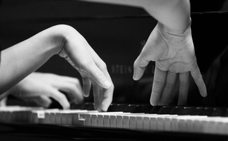 Hands Playing Piano