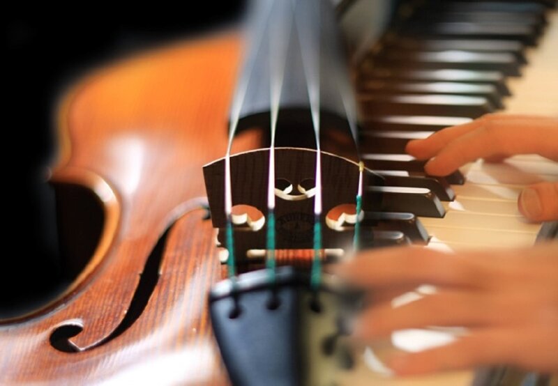 Hands Playing Violin and Piano